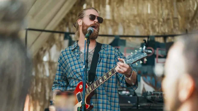 Sam Ryder performing on stage at The Pop-Up Hotel